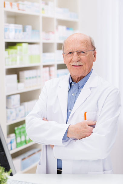 Confident pharmacist in the pharmacy - Photo, image