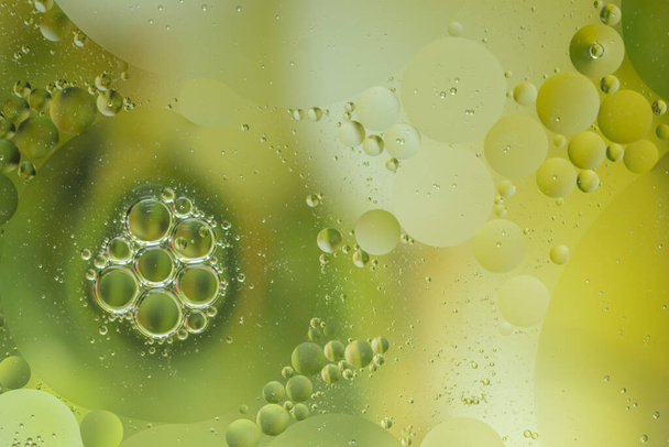 Κύκλος πετρελαίου & νερού αφηρημένη πολύχρωμο φόντο μακροεντολών - Φωτογραφία, εικόνα