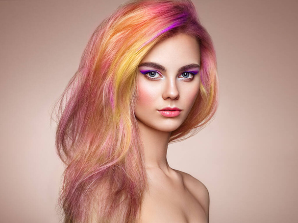 Beauty Fashion Model Girl with Colorful Dyed Hair. Girl with Perfect Makeup and Hairstyle. Model with Perfect Healthy Dyed Hair - Photo, image