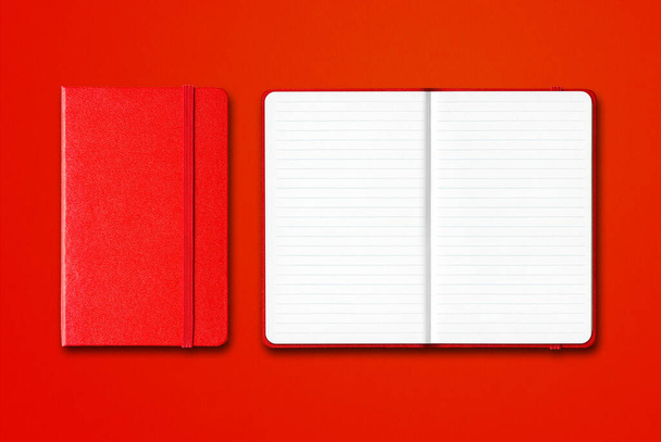 Red closed and open lined notebooks mockup isolated on colorful background - Fotografie, Obrázek