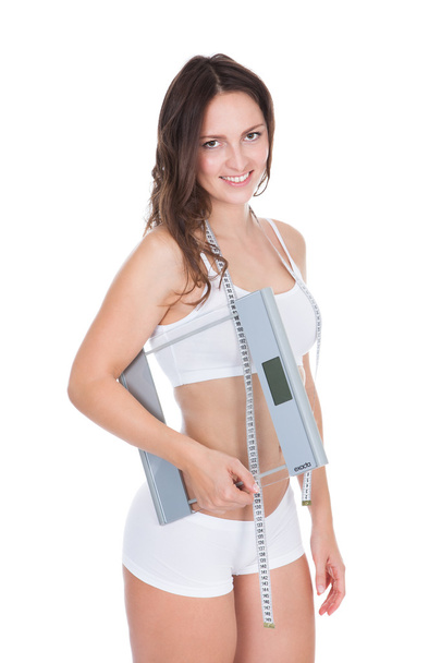 Slim Young Woman Holding Weight Scale - Fotó, kép
