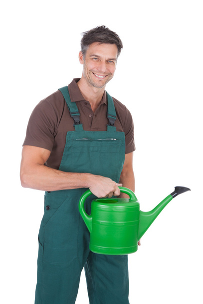 Gardener With Watering Can - Valokuva, kuva