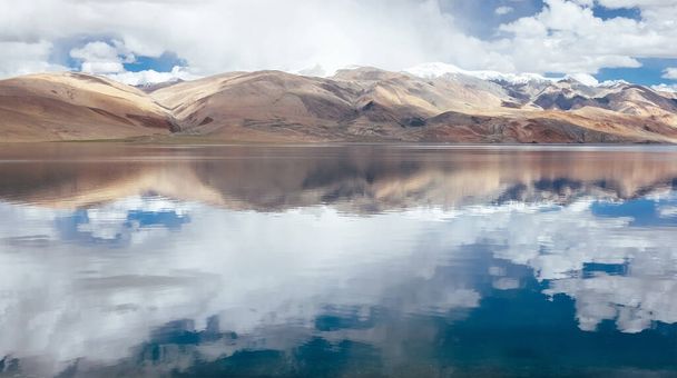 Himalayan mountains mirrored reflected in Tso Moriri mountain Lake water surface near Karzok or Korzok village in the Leh district of Ladakh, India. - Fotografie, Obrázek