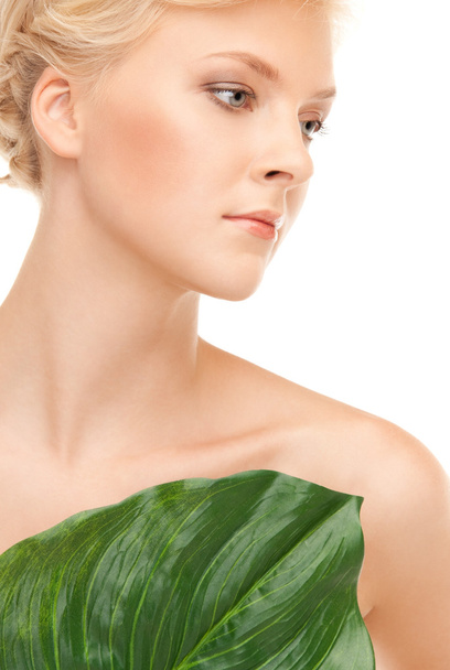 Woman with green leaf - Foto, Imagen