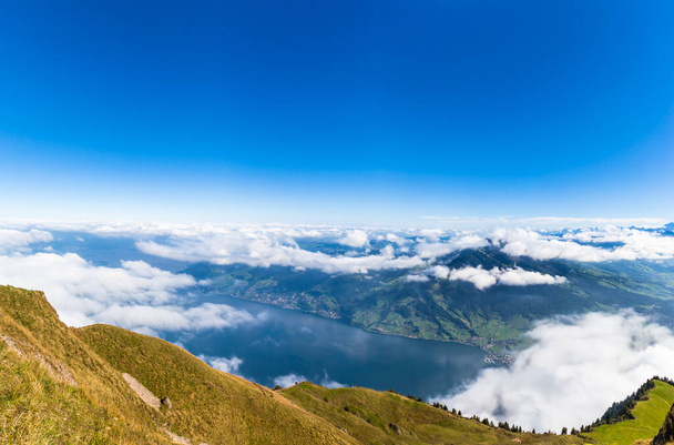 Aerial view of Lucerne lake and the Alps with cloud scape from top of Rigi mountain in Switzerland - Fotoğraf, Görsel