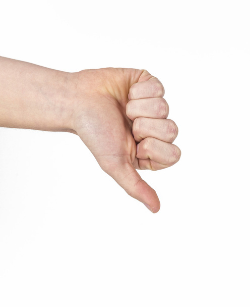 Великі пальці вниз знак ізольовані на білому
 - Фото, зображення