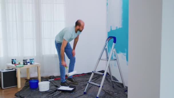 Handyman painting wall - Footage, Video