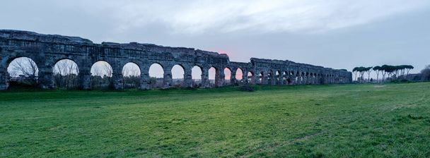 Ruins of Roman aqueduct Aqua Claudia in Parco degli Acquedotti park, Rome, Italy - Photo, Image