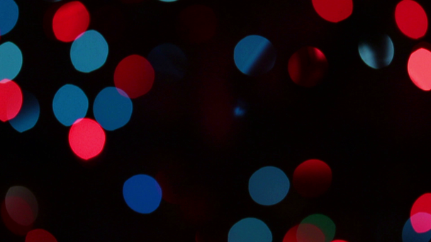 Keskittynyt värillinen pyöreä valot taustat - nukke ammuttu
 - Materiaali, video