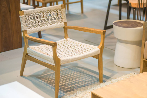 Modern wooden chair with white knitting rope interior for office building or home and living achitecture decoration contemporary concep - 写真・画像