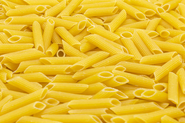 Penne pasta italiana como fondo - Foto, imagen