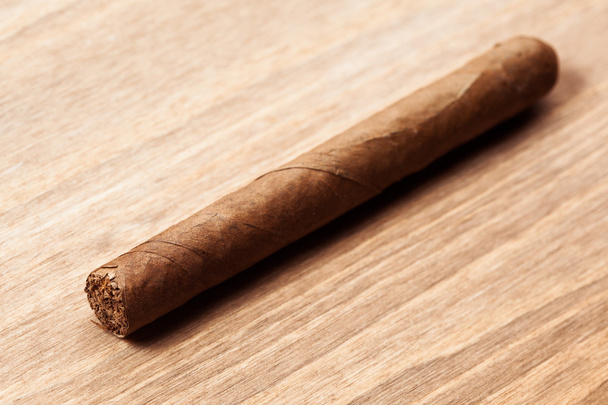 cigar on wooden background - Photo, Image