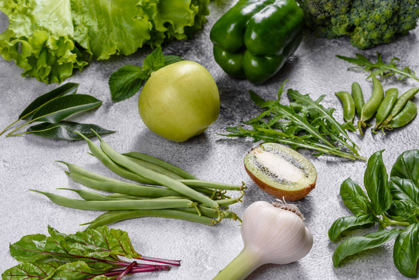 Flat lay series of assorted green toned vegetables, fresh organic raw produce - Foto, imagen