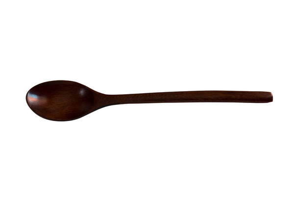 Дерев'яна ложка з довгою ручкою, що використовується для їжі, дерев'яні ложки виглядають красиво
 - Фото, зображення