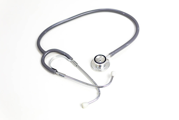 Medical and hospital concept. Stethoscope on white background. phonendoscope for doctor. Stethoscope bright background. Close up equipment medical Stethoscope. Selective focus. - Φωτογραφία, εικόνα