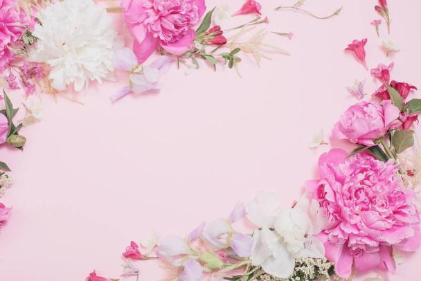 beautiful flowers on pink paper background - Fotoğraf, Görsel