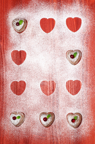 Valentine's Day cookies with cranberries and mint on red wooden table - Photo, Image