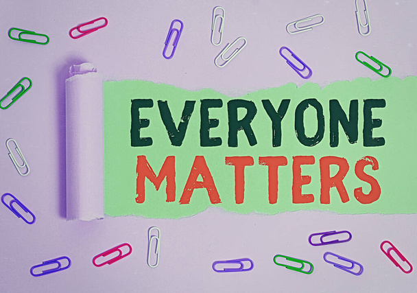Text sign showing Everyone Matters. Conceptual photo listen to all the voices at the table no bias or preference Rolled ripped torn cardboard placed above a wooden classic table backdrop. - Photo, Image