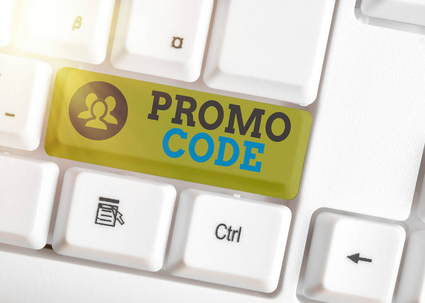 Text sign showing Promo Code. Conceptual photo letters or numbers that allows getting a discount on something White pc keyboard with empty note paper above white key copy space. - Photo, Image