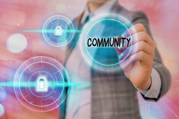 Text sign showing Community. Conceptual photo group of showing with a common characteristics living together Graphics padlock for web data information security application system. - Photo, Image