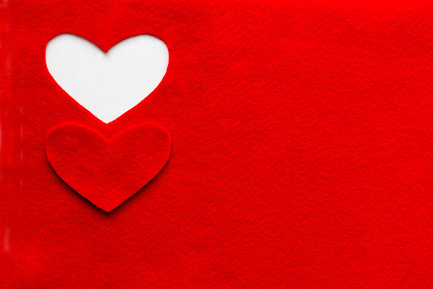 Heart carved in red felt. Background for design to Valentine's Day. - Foto, immagini