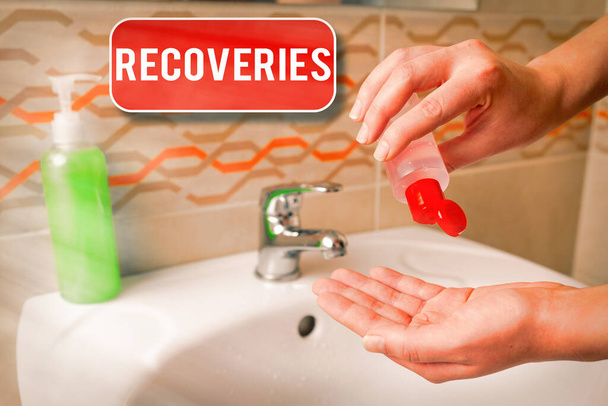 Conceptual hand writing showing Recoveries. Business photo showcasing process of regaining possession or control of something lost Handwashing procedures for minimizing bacterial growth. - Photo, Image