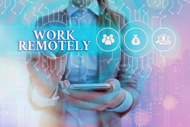 Text sign showing Work Remotely. Conceptual photo fresh working style where employees handles job away from the public System administrator control, gear configuration settings tools concept. - Photo, Image