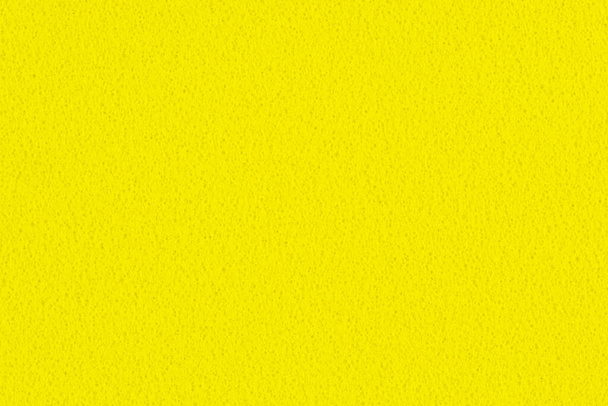 Макрофотография желтого градиентного цвета с текстурой из настоящей пенопласта для фона, фона или дизайна
. - Фото, изображение