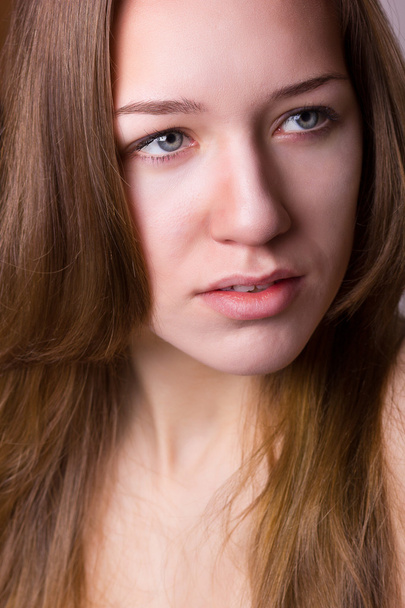Studio beauty portrait of a beautiful young woman - Фото, изображение