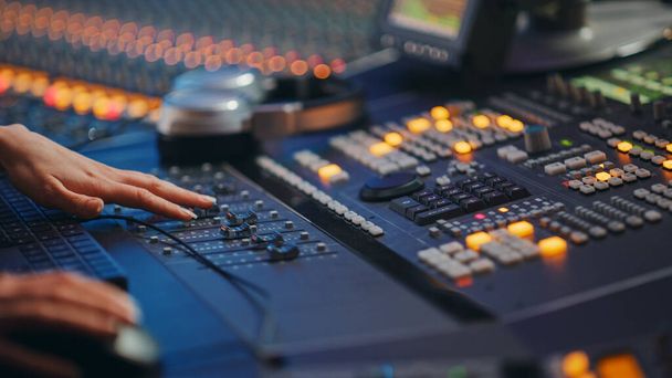Modern Music Record Studio Control Desk with Equalizer, Mixer and other Professional Equipment. Switchers, Buttons, Faders, Sliders, Motorized Faders Move, Record, Play Hit Song. Close-up - Fotoğraf, Görsel