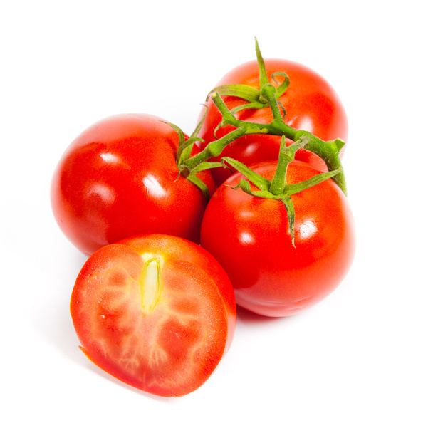 Closeup of tomatoes on the vine isolated on white. Tomato branch - Foto, afbeelding