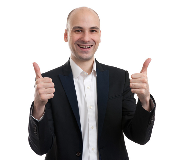 Hombre de negocios sonriente con el pulgar hacia arriba
 - Foto, Imagen