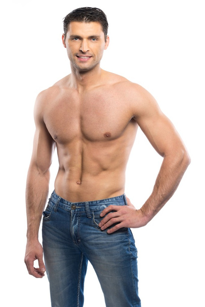 Joven guapo en jeans azules con torso desnudo
 - Foto, Imagen