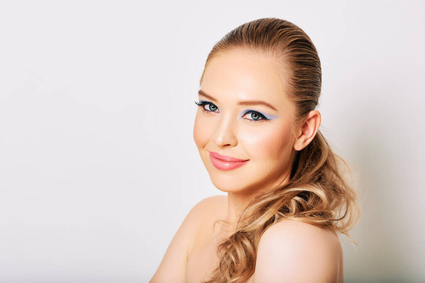 Close up portrait of beautiful young woman on white background - Φωτογραφία, εικόνα