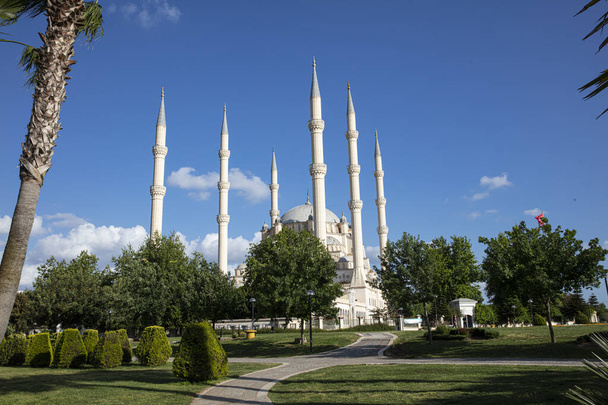 Sabanci Central Mosque from Central Park in Adana,Turkey. Sabanci Central Mosque with 6 Minarets. Turkish name; Adana Merkez (Sabanci) Camii. - Photo, Image