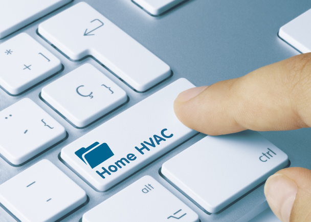 Home HVAC Написано на Blue Key металевої клавіатури. Клавіша натискання пальця
. - Фото, зображення