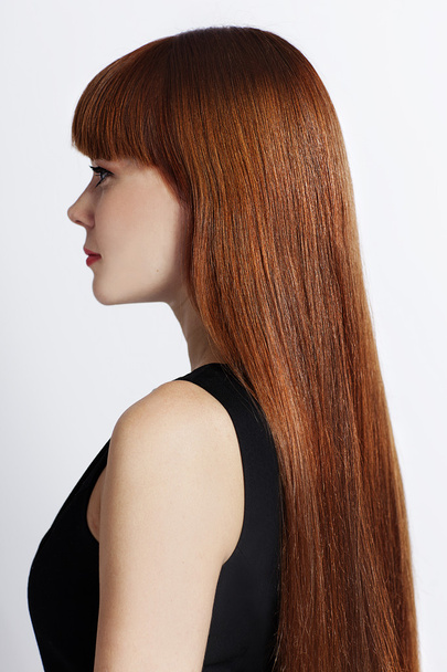 Портрет женщины с рыжими волосами
 - Фото, изображение