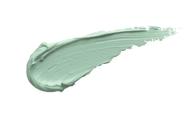 Vihreä väri korjaa peitevoide preparaatti tahra eristetty valkoisella pohjalla. Paksua kermaa. Kasvonaamio, ihonhoito kauneus tuote swatch lähikuva - Valokuva, kuva