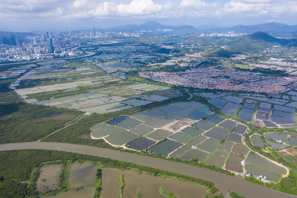 Vista aérea de Yeun Long e nas proximidades, Novos Territórios Hong Kong
 - Foto, Imagem