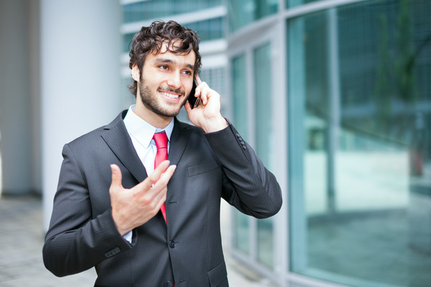 Businessman talking on the phone - Foto, Bild