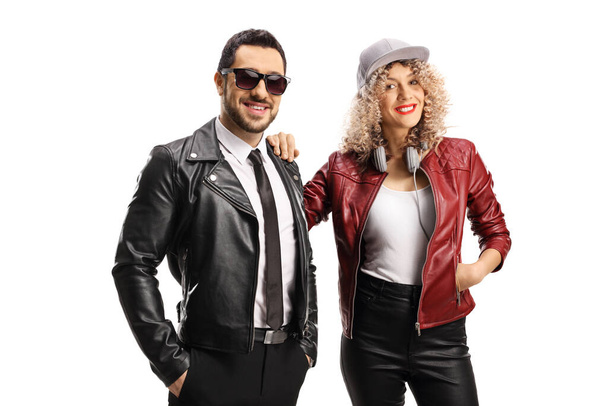 Trendy young man and woman in leather jackets isolated on white background - Foto, Imagem