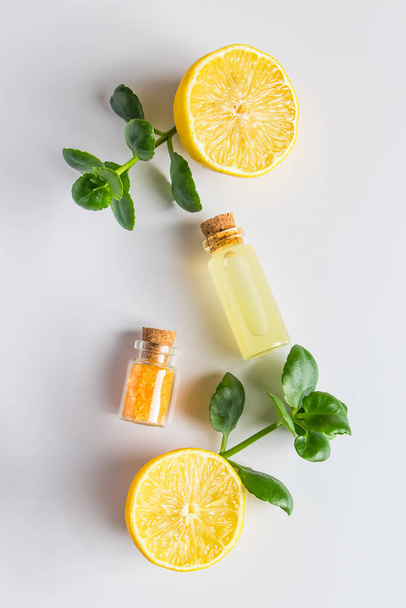 Cosmetic oil of lemon on white background. Eco product for alternative medicine. Place for text. - Foto, Imagem