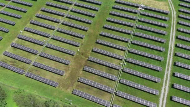 Aerial view of solar power station. Aerial view of solar farm. Concept of clean energy, green energy, renewable energy. Alternative energy concept. Photovoltaic panels.  - Footage, Video