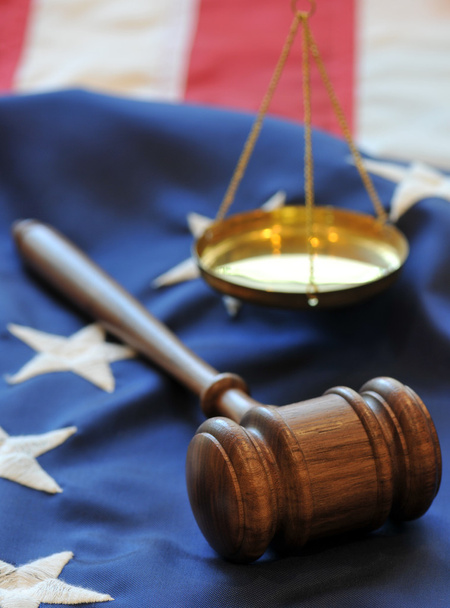 Gavel and scales atop flag background - Foto, immagini