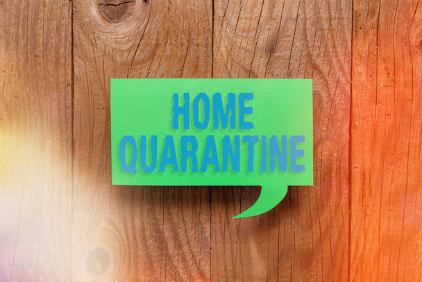 Conceptual hand writing showing Home Quarantine. Business photo showcasing Encountered a possible exposure from the public for observation Paper accessories with smartphone on different background. - Zdjęcie, obraz