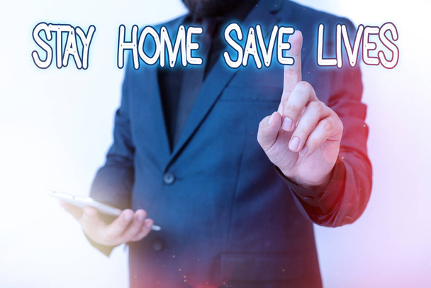 手書きテキスト｜Stay Home Save Lives.感染患者の数を減らすという考え方ナビゲーションの進歩を象徴する手指を指差すモデル. - 写真・画像