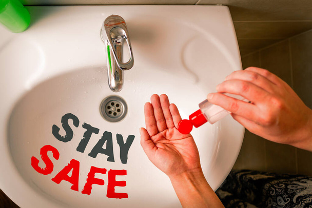 Text sign showing Stay Safe. Conceptual photo secure from threat of danger, harm or place to keep articles Handwashing procedures for decontamination and minimizing bacterial growth. - Photo, Image