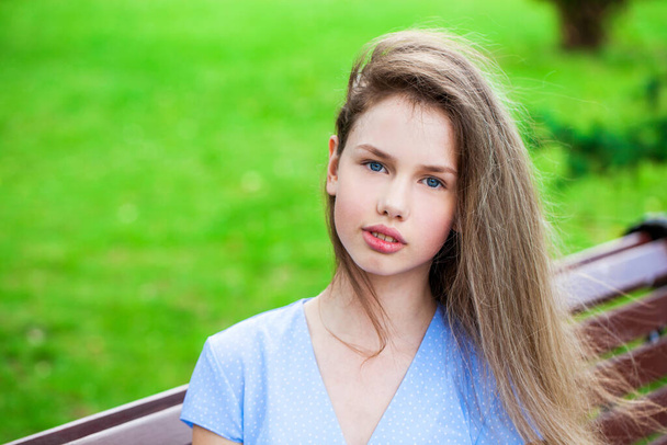Portrait of a young beautiful girl in a summer dress  - Foto, Bild