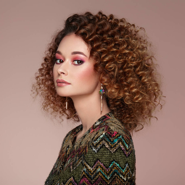 Portrait of a beautiful elegant woman. Curly afro hairstyle - Foto, Imagem