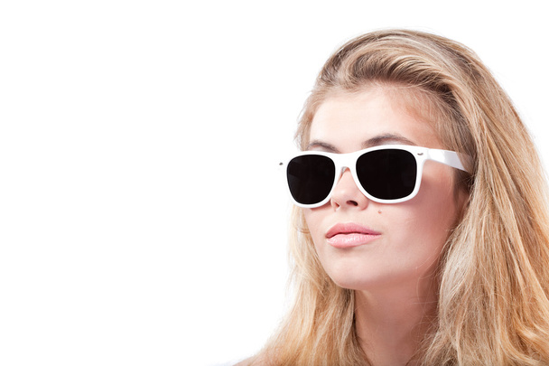 Closeup portrait of confident blonde woman in sunglasses - Фото, изображение